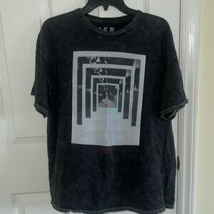 Her graphic tee worn gently